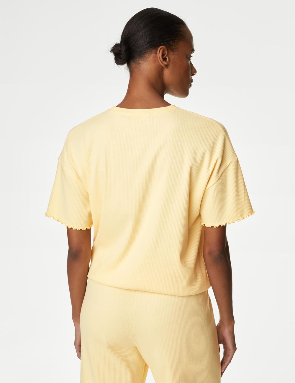 Top de manga corta de canalé