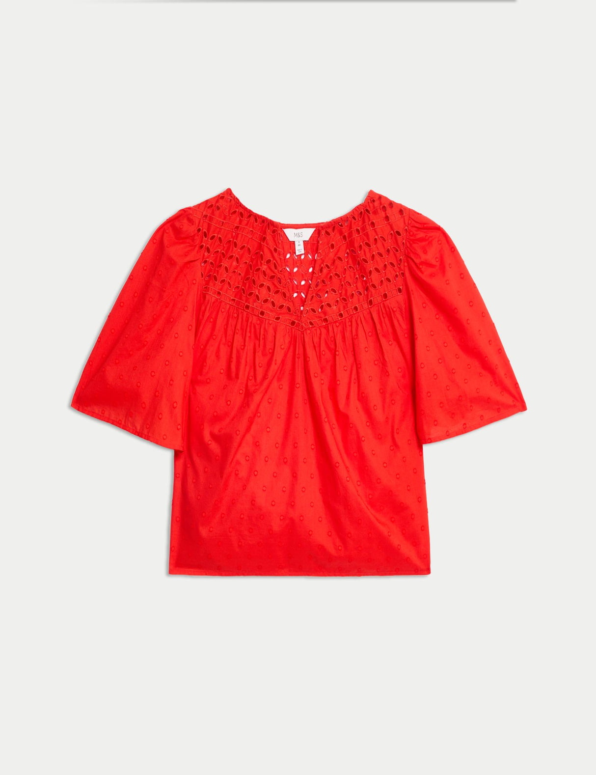 Blusa bordada de manga corta