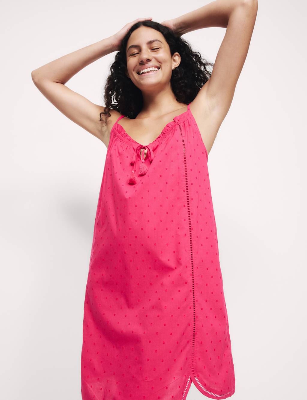 Camisola de tiros con lazada con borlón