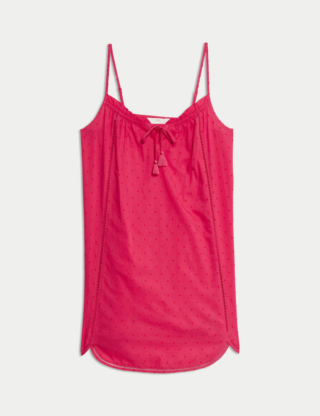 Camisola de tiros con lazada con borlón