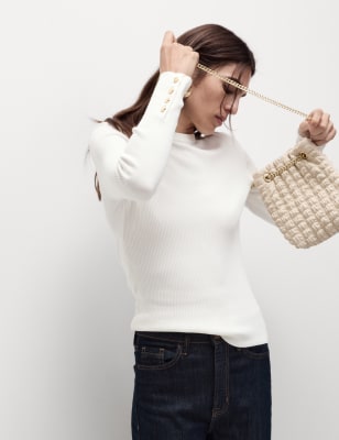 Jersey con detalle de botón en la manga