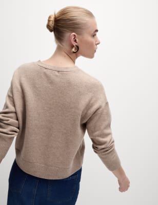 Rebeca con bolsillos y botones