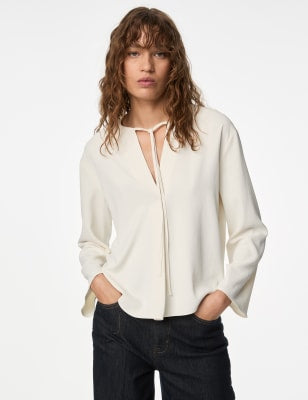 Blusa de manga japonesa con lazada