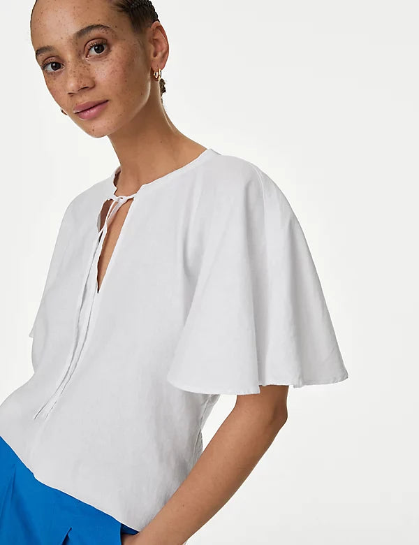 Blusa de lino  de manga corta