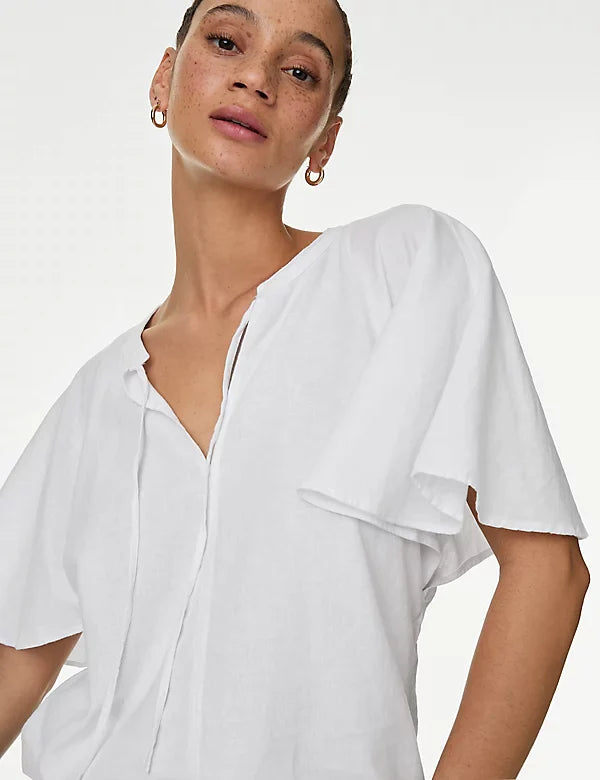 Blusa de lino  de manga corta