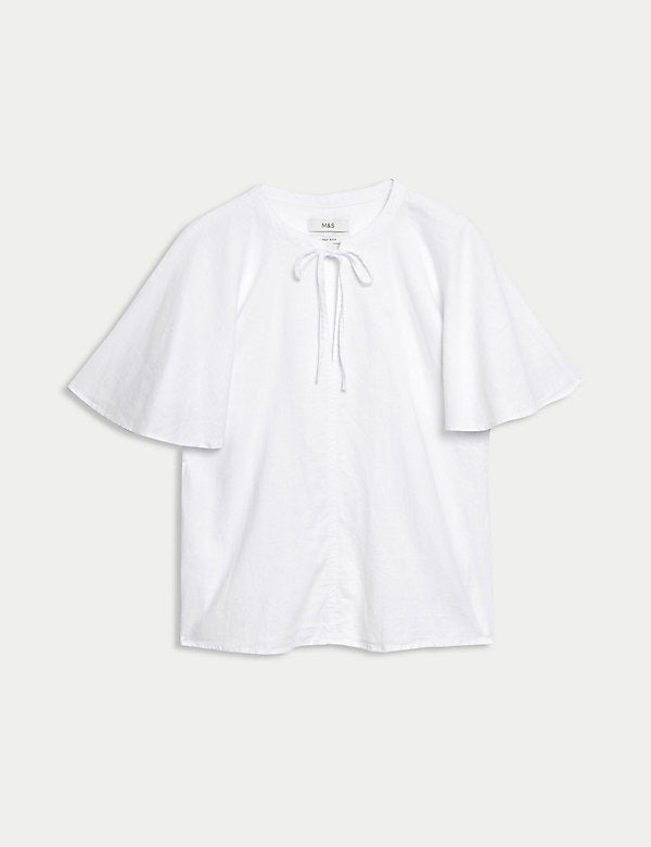 Blusa de lino  de manga corta