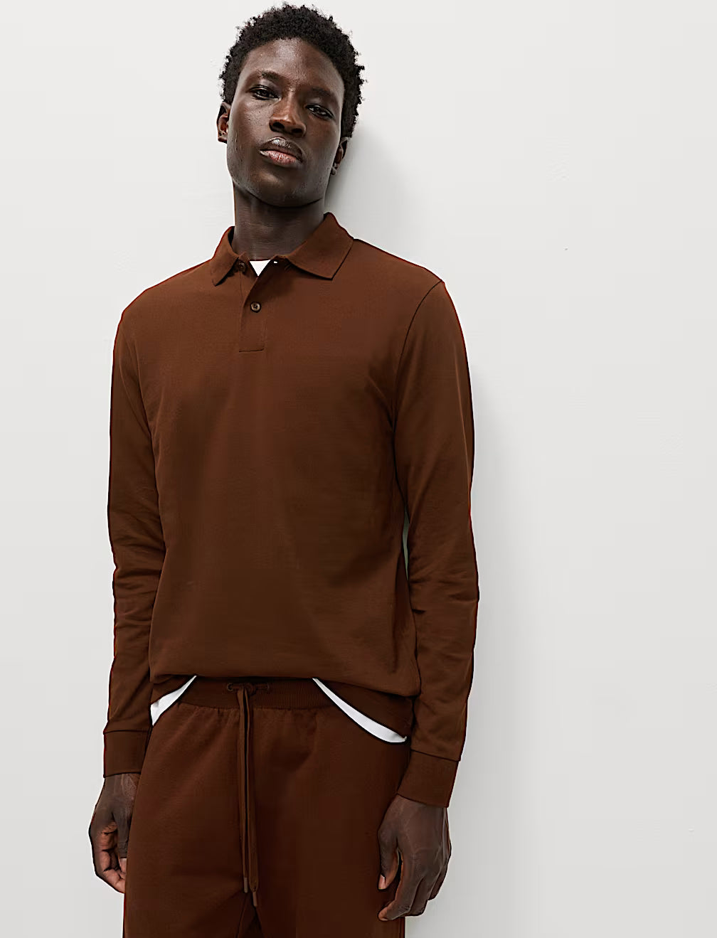 Polo liso de manga larga