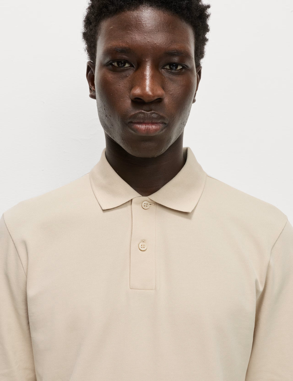 Polo liso de manga larga