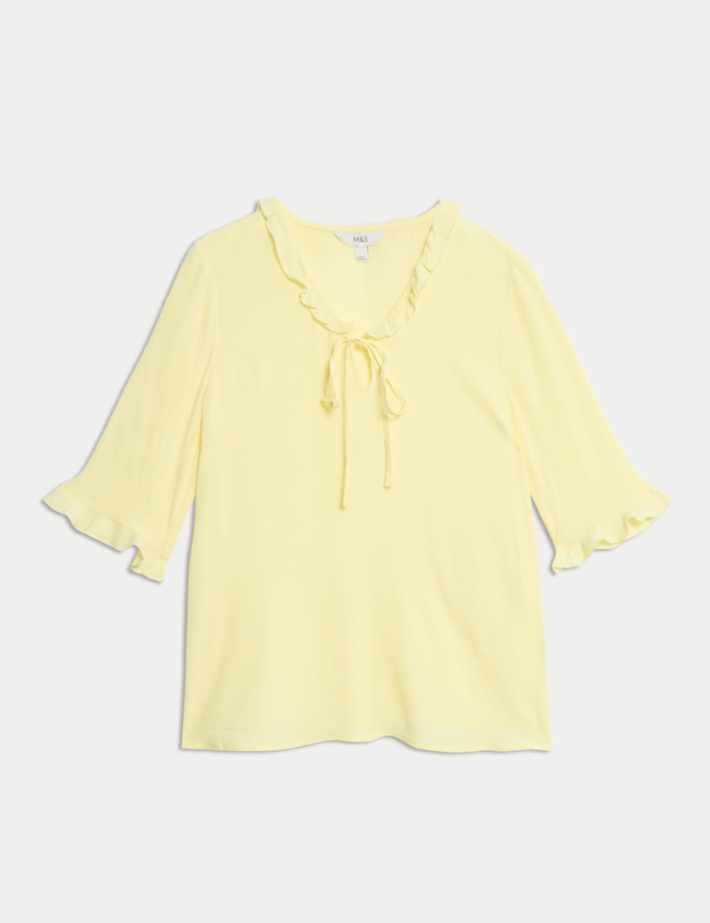 Blusa de manga corta con detalle volante