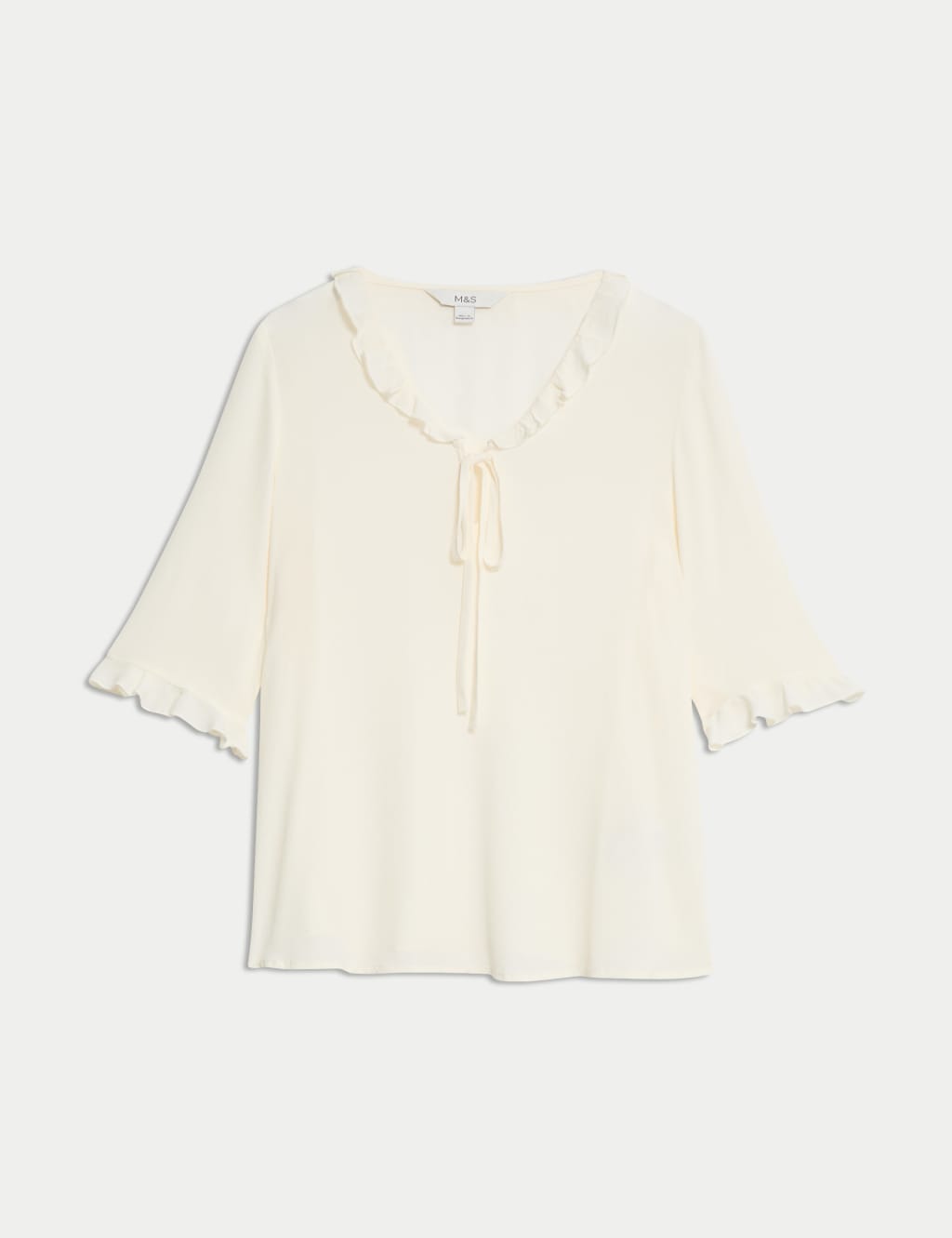 Blusa de manga corta con detalle volante