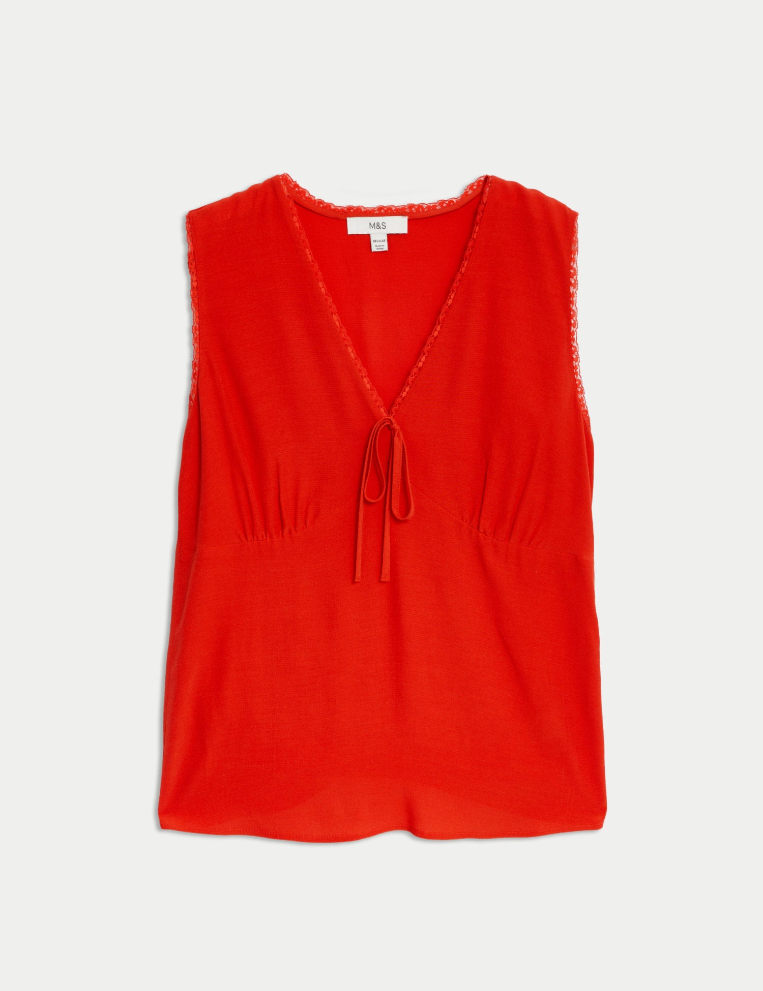 Blusa sin mangas con escote pico y lazo