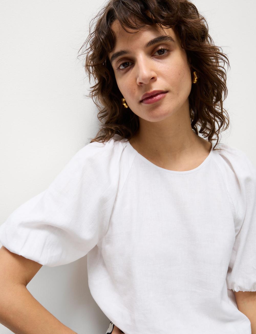 Blusa de lino con manga corta abullonada
