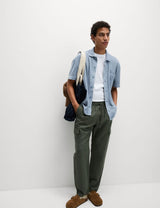 Polo de manga corta con cierre con botones