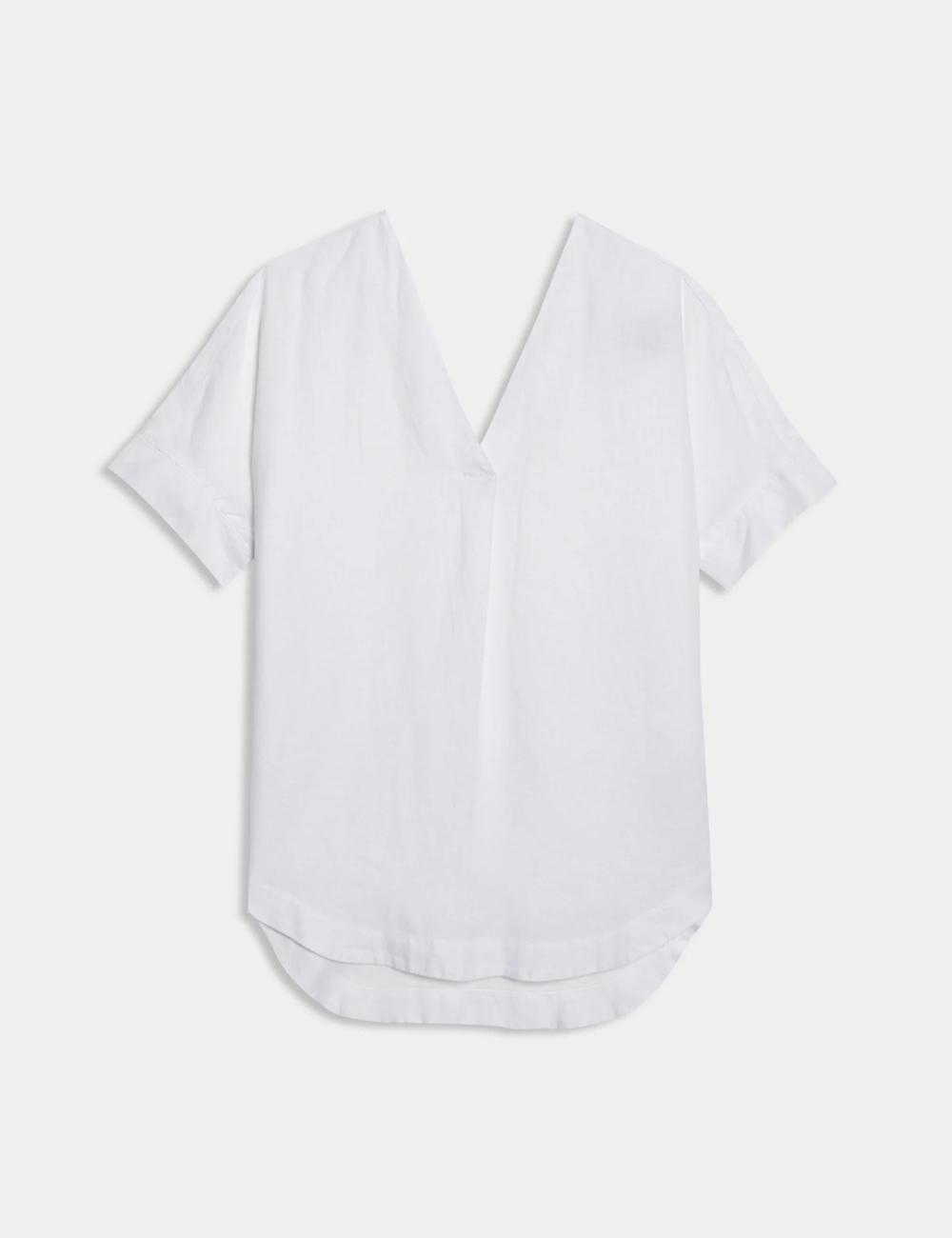 Blusa de lino de manga corta lisa