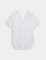 Blusa de lino de manga corta lisa
