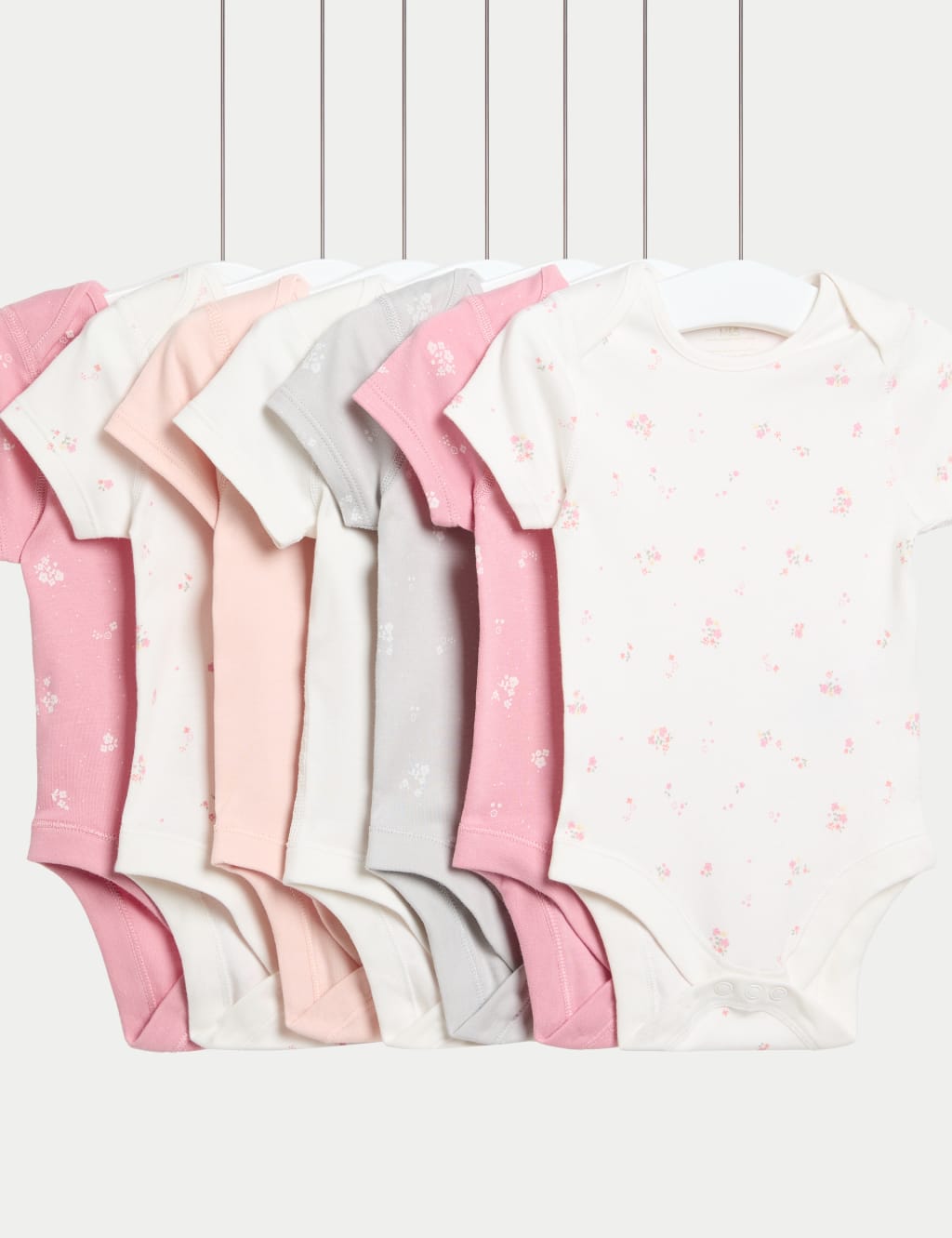 Pack de 7 bodies de algodón diseño floral