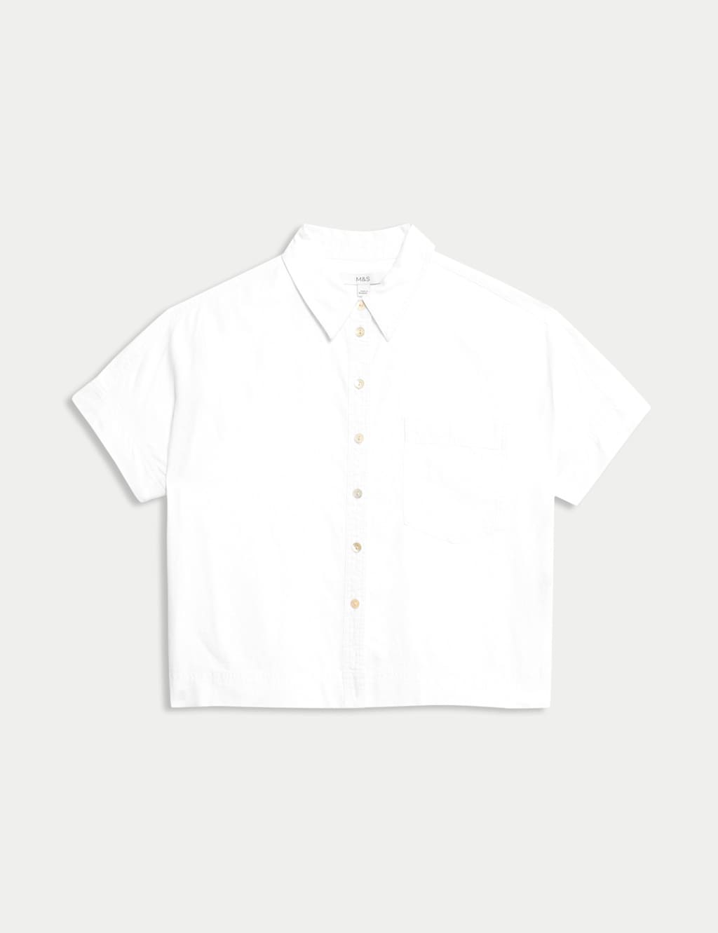 Blusa de lino de manga corta con bolsillo