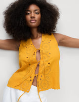 Blusa de lino sin mangas calada y detalle lazos