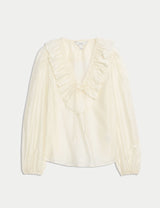 Blusa de manga larga con volante