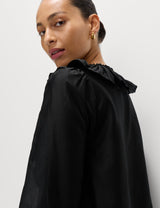 Blusa de manga larga con volante