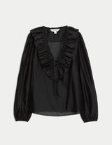 Blusa de manga larga con volante