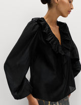 Blusa de manga larga con volante