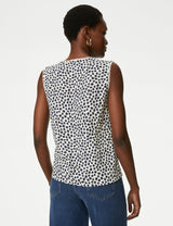 Blusa sin mangas con diseño y escote pico
