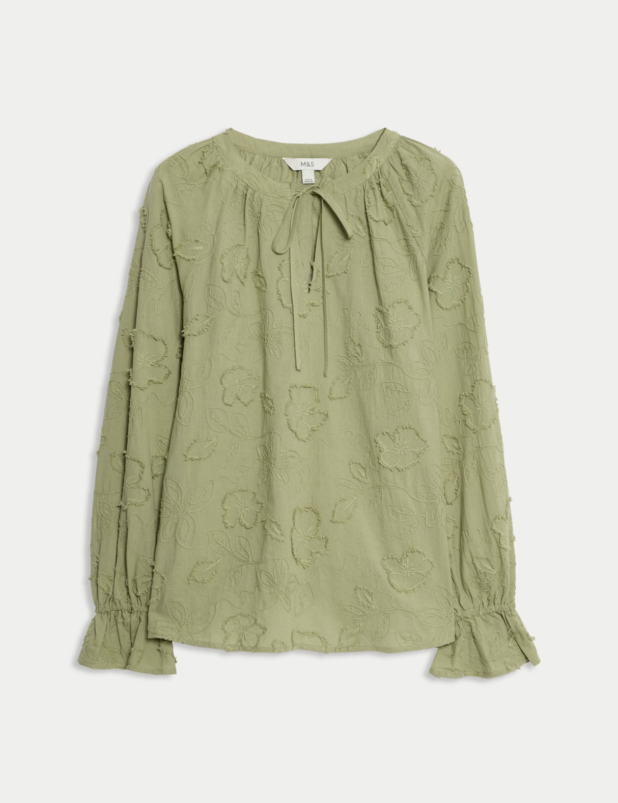 Blusa de manga larga con cuello maho y apliques