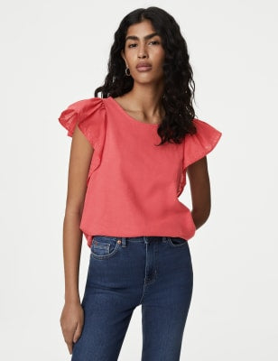 Top con mangas bordadas