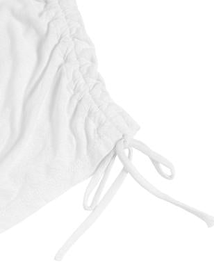 Top de lino con detalle fruncido en el hombro