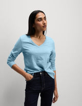 Top de manga larga con escote pico