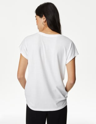 Camiseta básica de manga corta y escote pico de corte relax