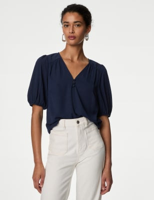 Blusa de manga semilarga y escote pico