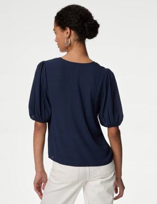 Blusa de manga semilarga y escote pico