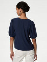 Blusa de manga semilarga y escote pico