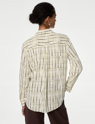 Blusa de manga larga abotonada con diseño