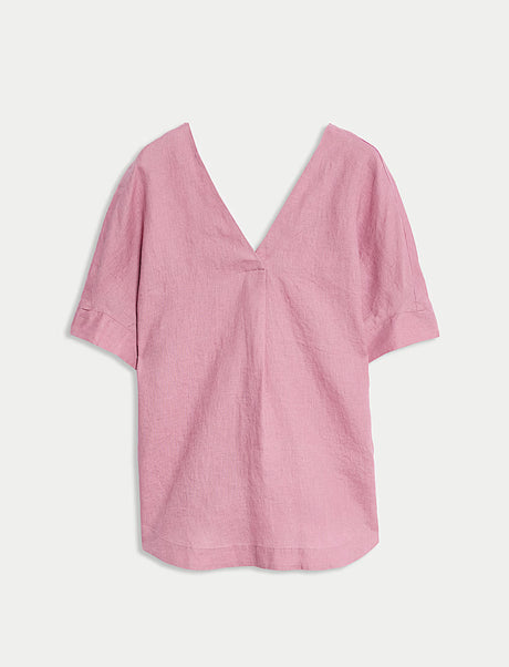 Blusa de lino de manga corta lisa