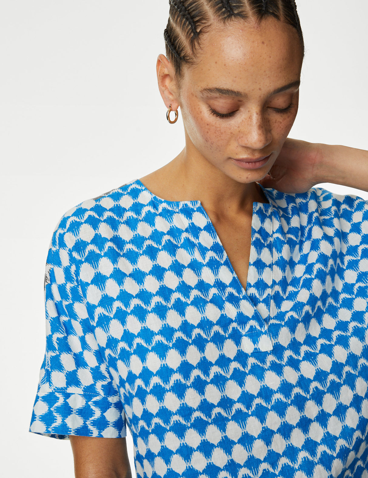 Blusa de lino con diseño de manga corta