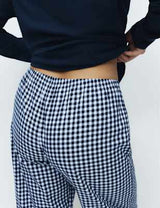 Pijama con top de punto de manga larga y pantalón en tela