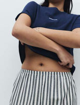 Pijama con top de punto de manga corta y pantalón en tela