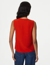 Blusa sin mangas con escote pico y lazo