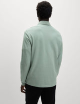 Polo de manga larga liso